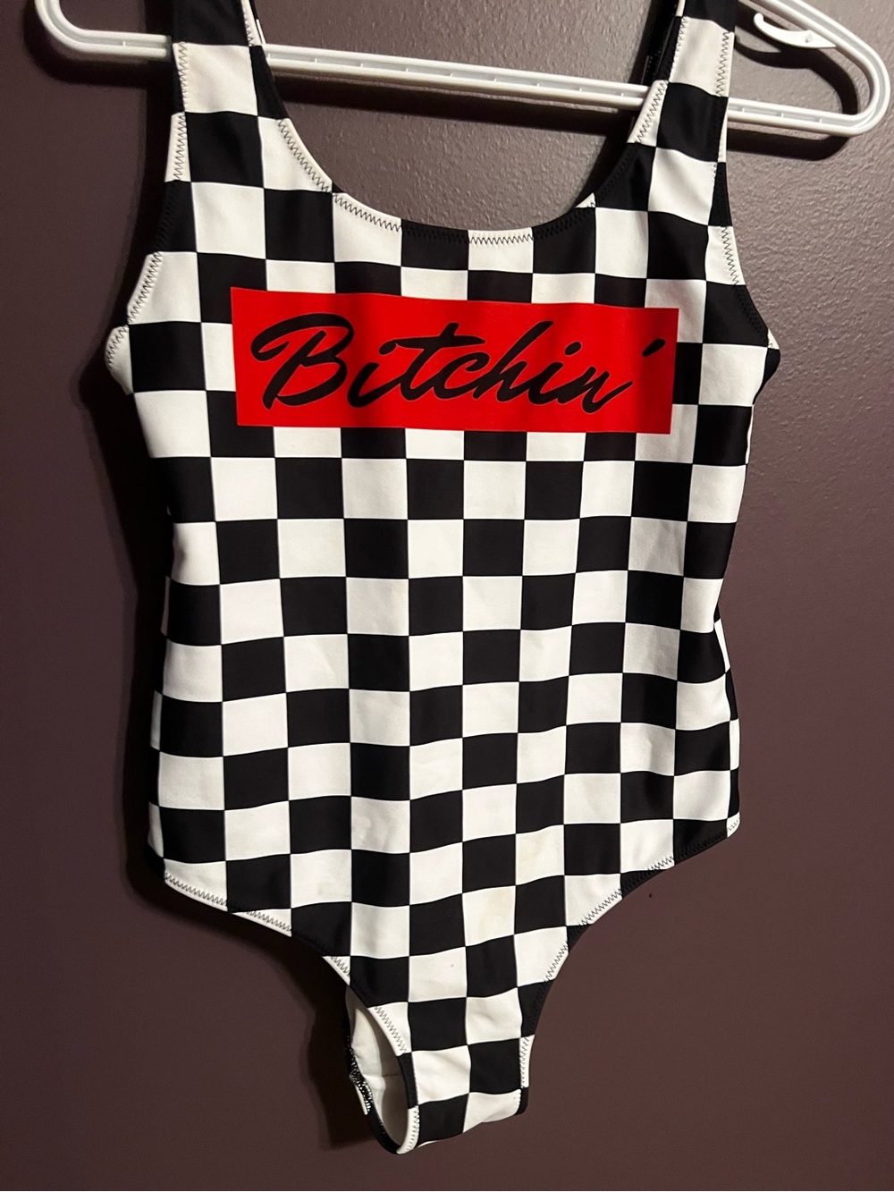 Checkerboard One-Piece Swimsuit with Red Accent